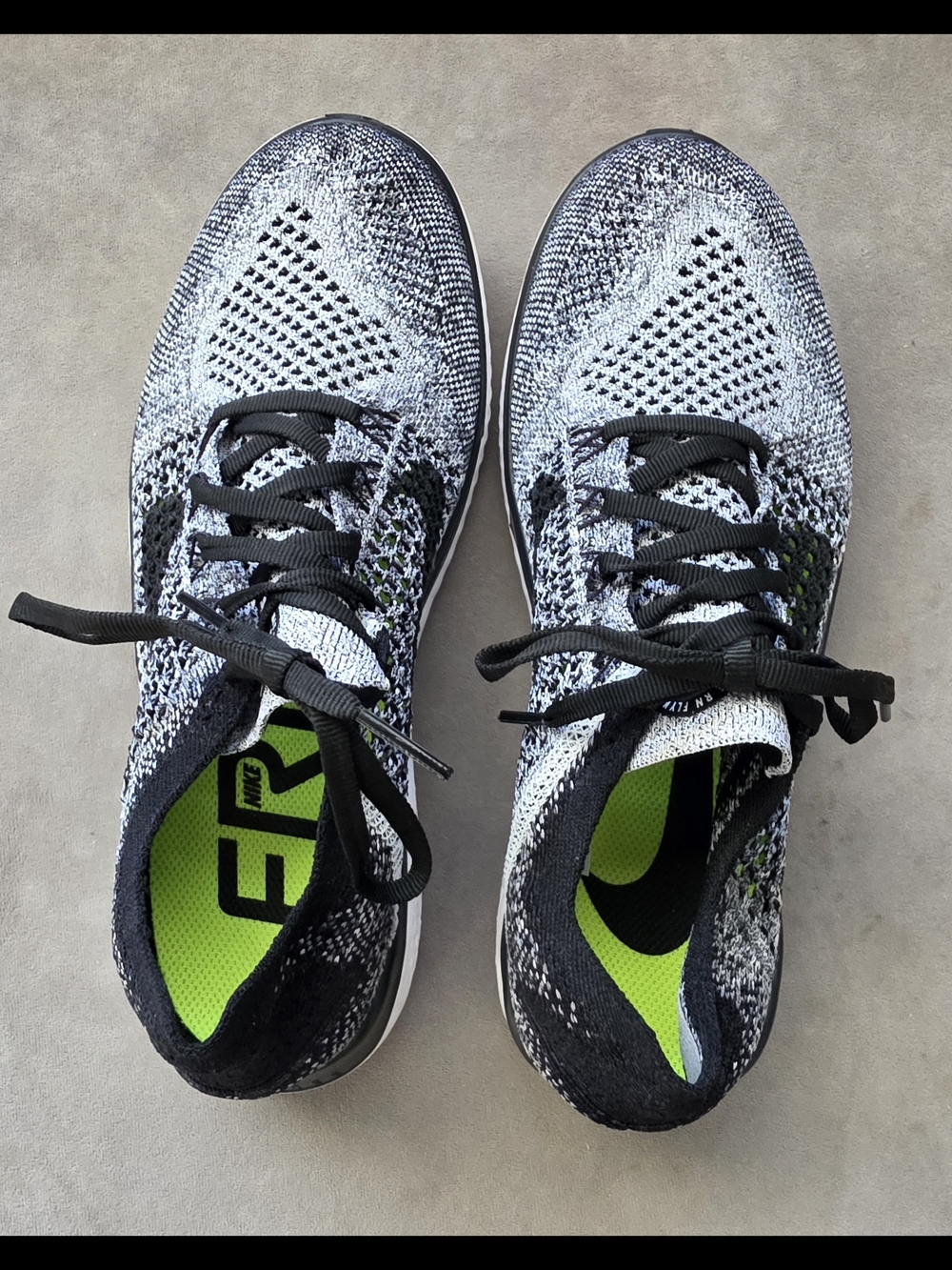 Nike Women's Black & White Flyknit Running Shoes with Neon Green Insole